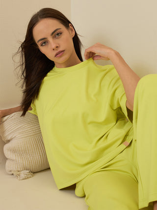 A women wearing lime sorbet half sleeve t shirt pyjama set