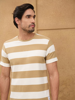 Men's tan and white striped t-shirt with textured fabric.
