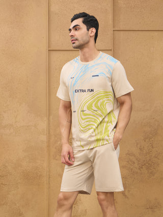 Men's beige shorts and t-shirt set with a marble print and "EXTRA FUN" graphic.