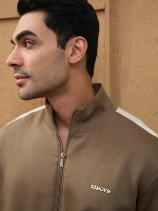 Men's brown SDMOVE zip-up track jacket with white shoulder stripes.