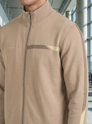 Men wearing a beige zip-up sweatshirt with subtle geometric detailing.