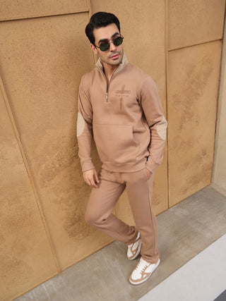 Men in a tan, athletic-fit loungewear set with a cross and "FAITH" print.