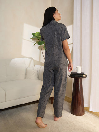 Women's grey floral print sleepwear set, viewed from the back.