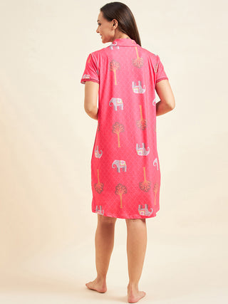 Women's pink short-sleeve knee-length nightgown with an elephant and tree print.