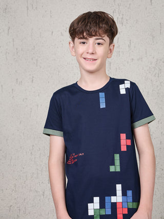 BOYS, standing, navy t-shirt with pixelated block print.