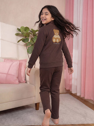 Girls' brown sweat suit with a teddy bear graphic.