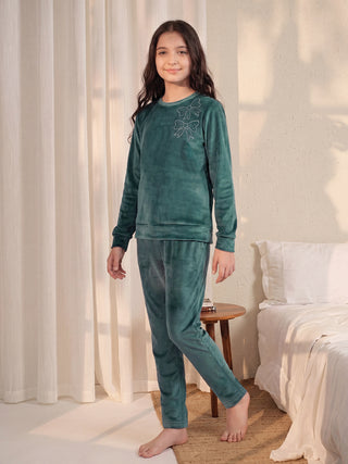 Girls' teal velour pajama set with a bow print.