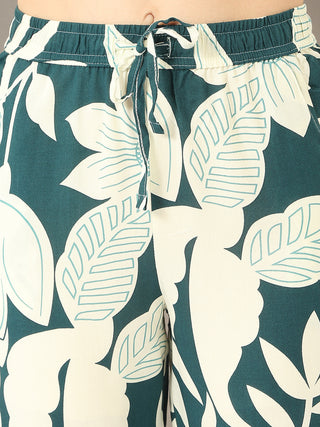 Women's emerald green floral print sleep shorts with a drawstring waist.