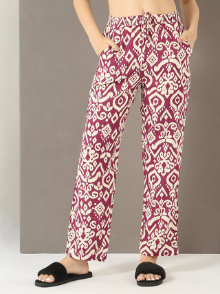Women lounging in patterned sleepwear.