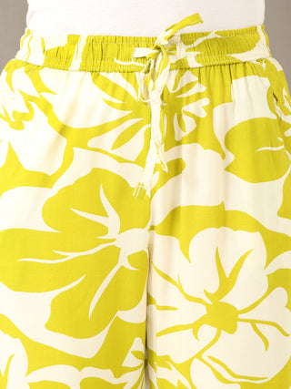 Women's cream and lime green floral print drawstring pajama pants.