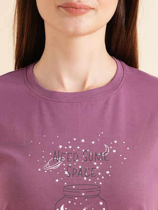 Women's purple t-shirt with "Need Some Space" graphic.