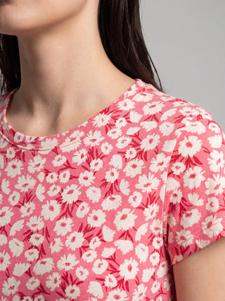 Women's pink floral print short-sleeve top.