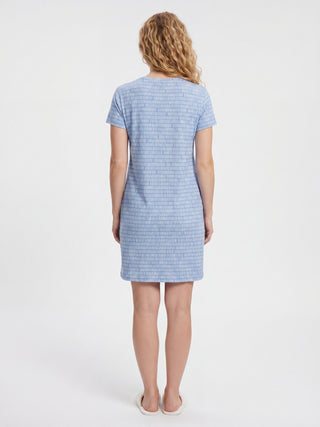 Women's blue short-sleeved patterned sleep dress, back view.