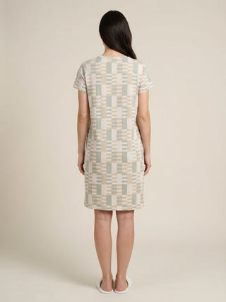 Women's light-colored geometric print short-sleeve shift dress, with the same features as the previous image.