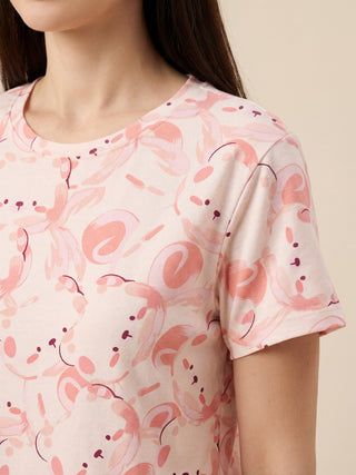 Women's pale pink cotton t-shirt with a playful all-over teddy bear print.