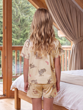 GIRLS light yellow short pajamas with a repeating Tom and Jerry print.