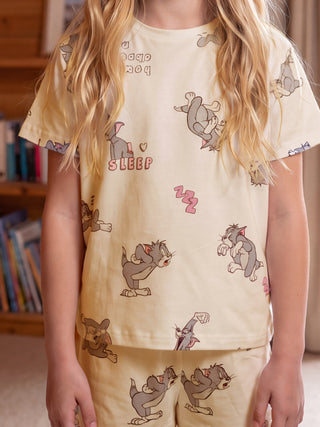 GIRLS' short-sleeved pajama set in light yellow with Tom and Jerry print.