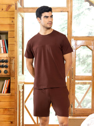 Men wearing a maroon t-shirt and shorts set.