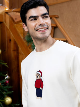 Men's cream crewneck sweatshirt with a Christmas teddy bear embroidery.