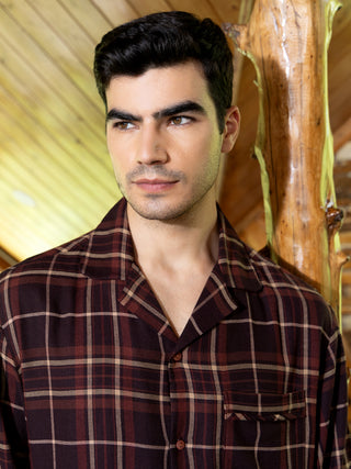 Men's maroon plaid pajama shirt.