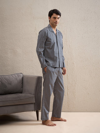 a men wearing a dark grey gentlemen printed pant set made of cotton modal aop