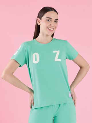 Women's seafoam green t-shirt and pants loungewear set with a white "OZ" print on the t-shirt.
