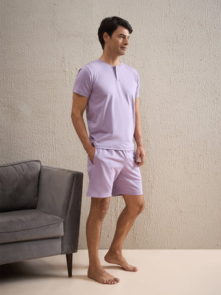 a men standing wearing lalic gentlemen solid shorts set made of cotton modal spandex