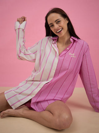 A women sitting ground wearing pink stripe full sleeve shirt