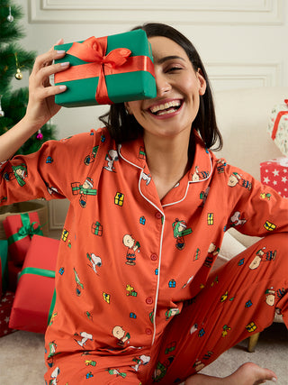 a girl weared red full sleeve front open pyjama set 
