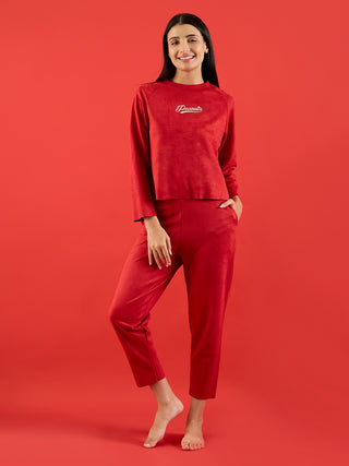 a women weared warm red full sleeve t shirt set